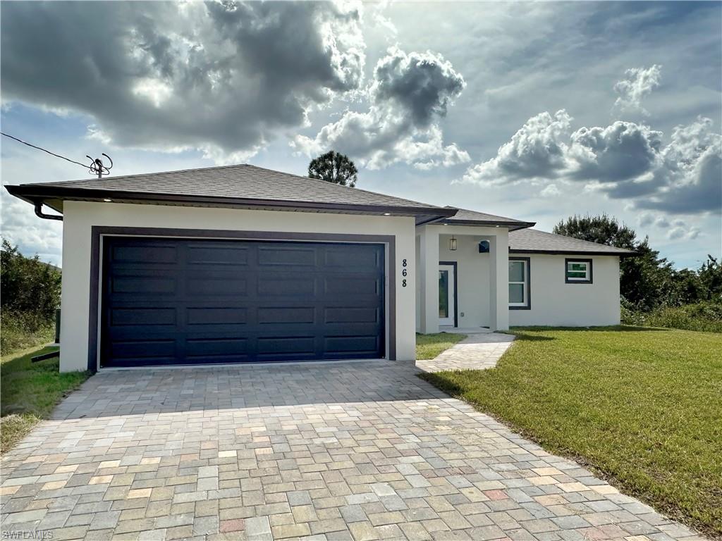 a front view of a house having yard