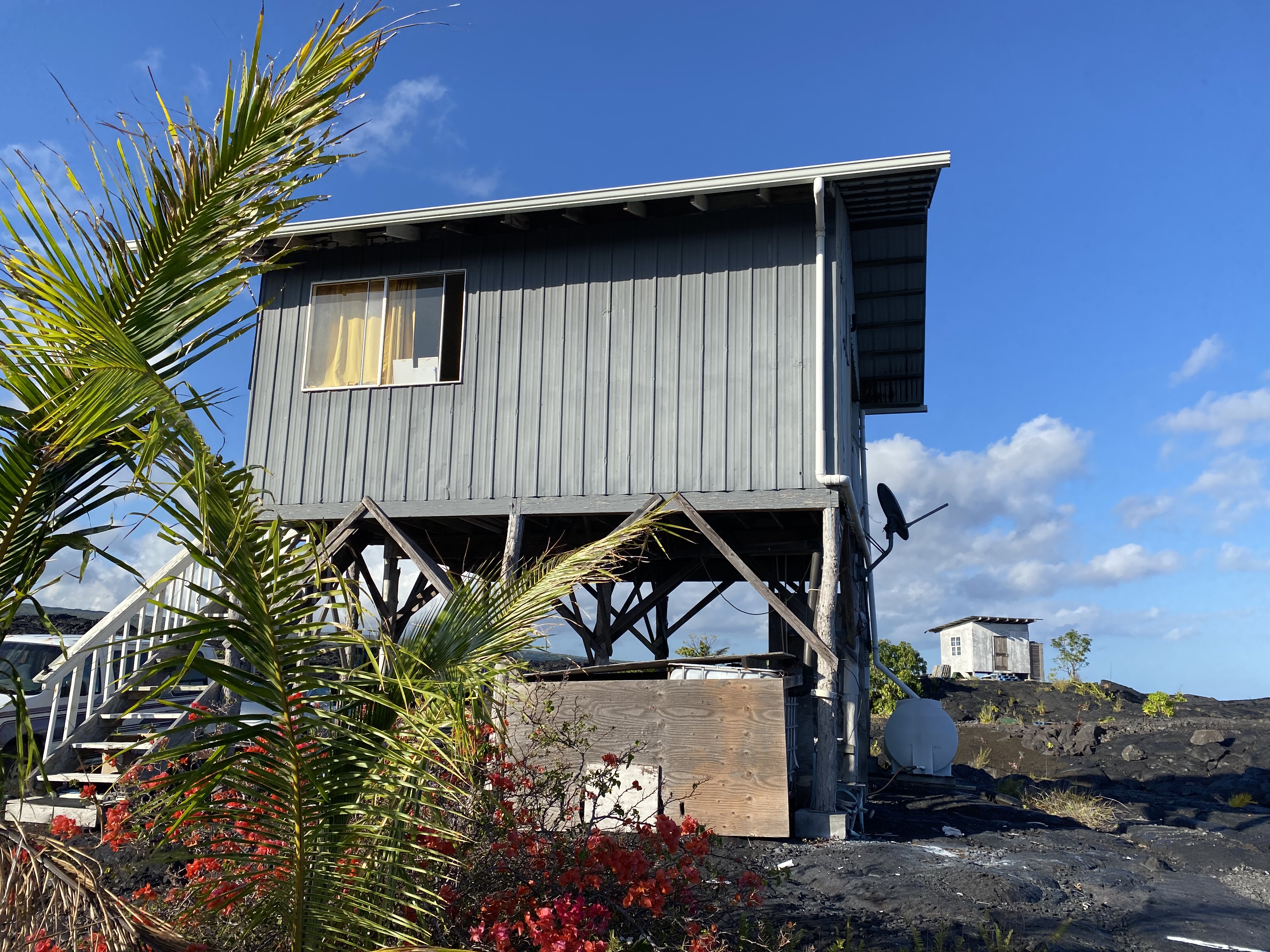 a view of a house with a roof deck