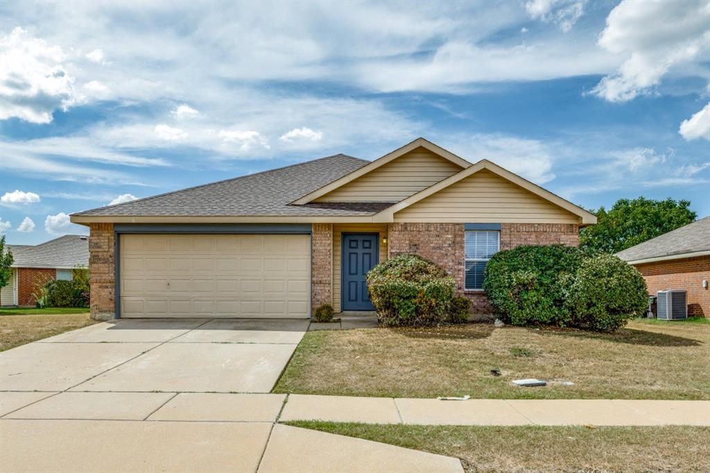 a front view of house with garage