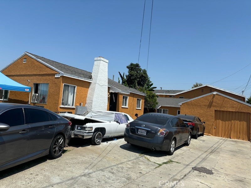 a car parked in front of a house