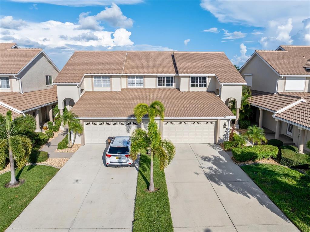 an aerial view of a house with a garden