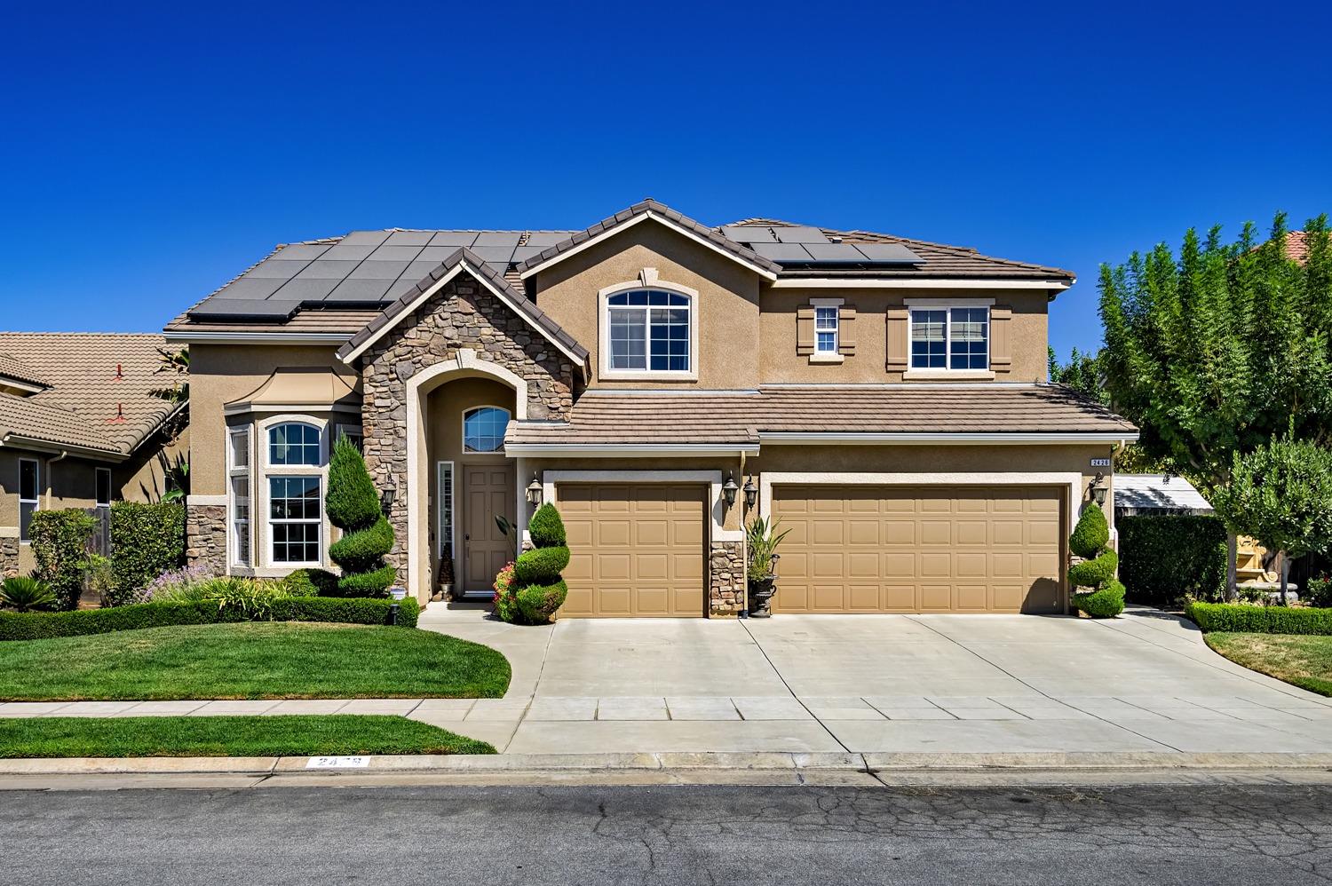 a house view with a garden space