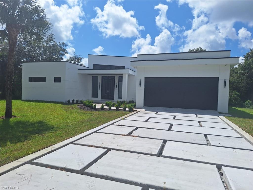 a view of a backyard of the house