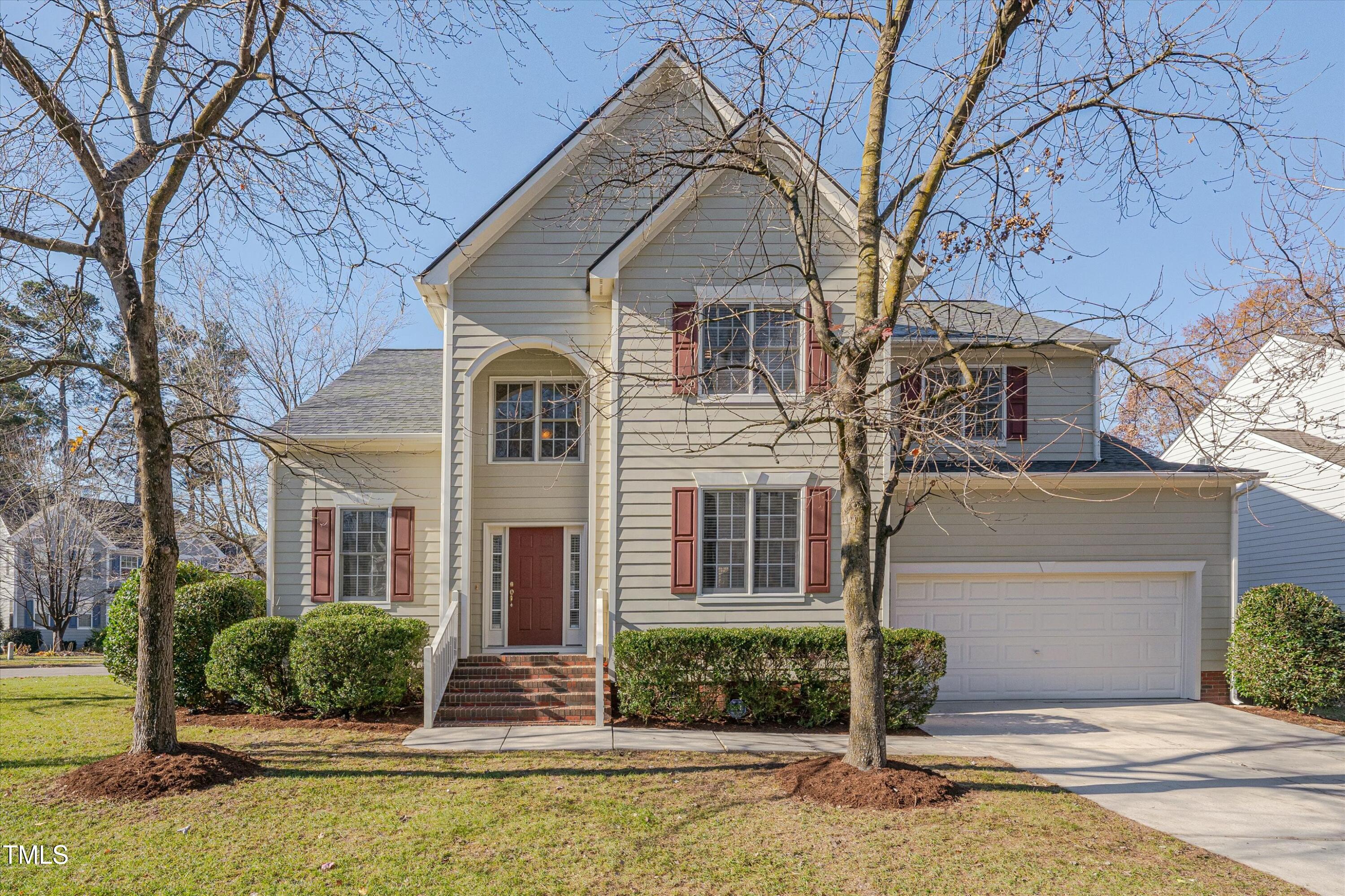 front view of a house with a yard