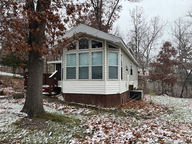 a house with trees in the background