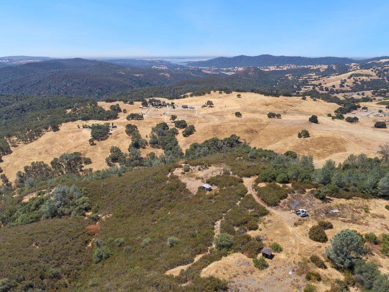 With views of Folsom Lake in the distance, this oasis at the crest of a hill has privacy yet 20 minutes from shopping and great restaurants.