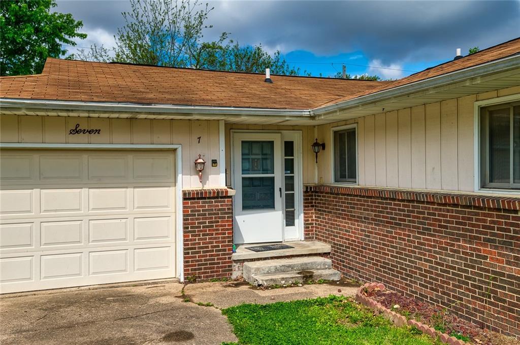 a view of a house with a garage