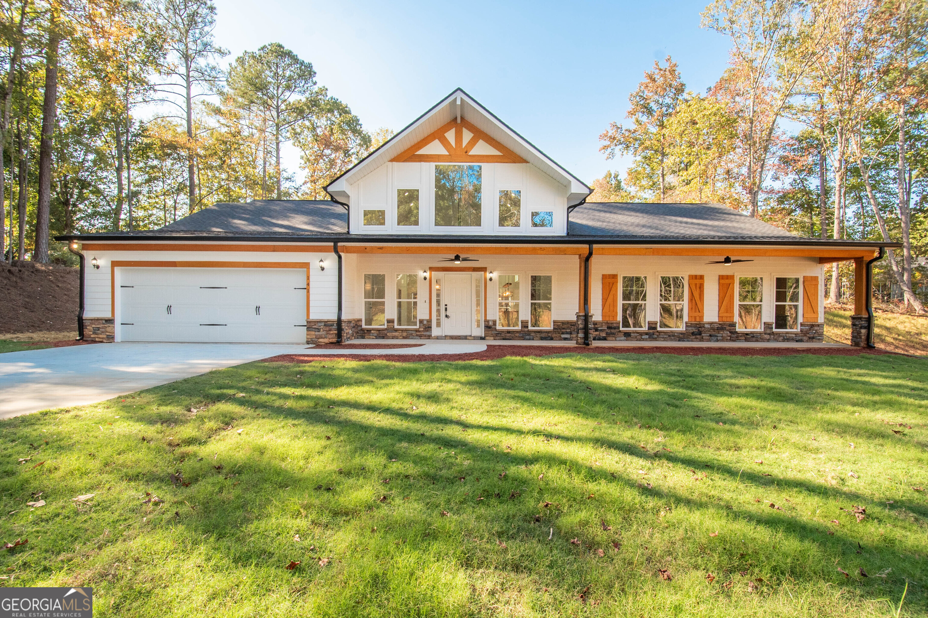 front view of a house with a swimming pool