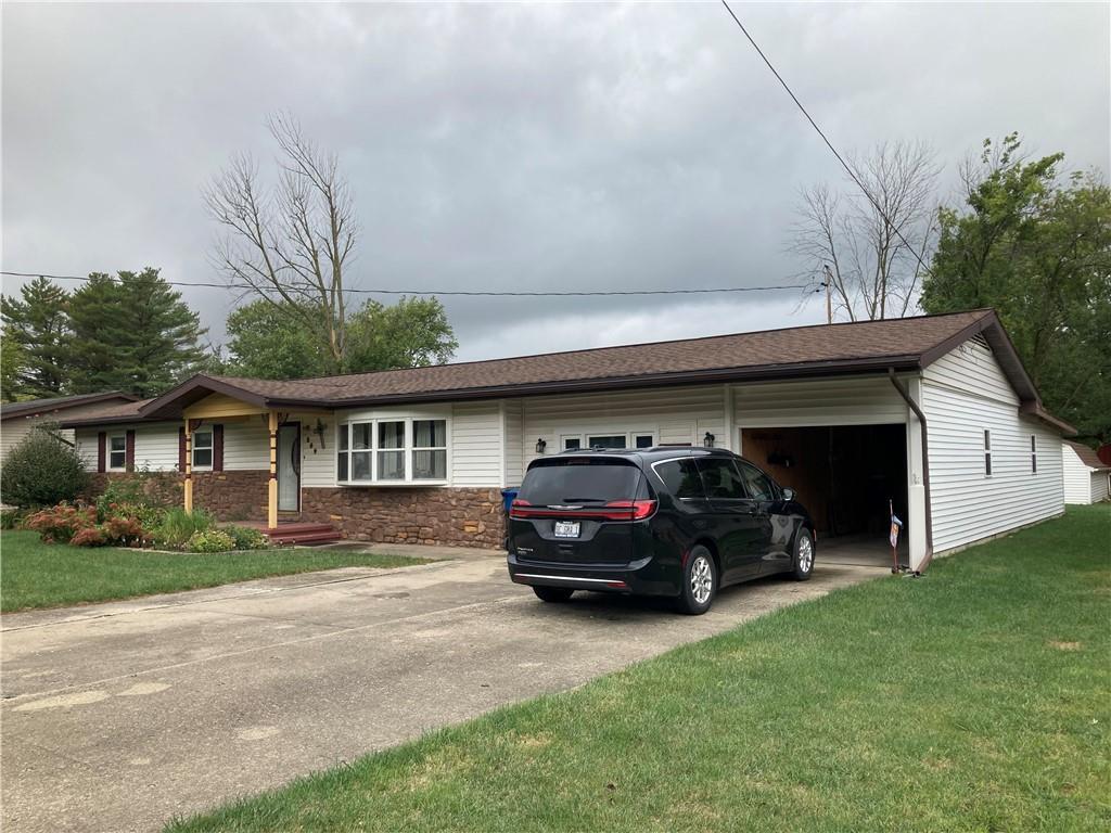 a car parked in front of a house