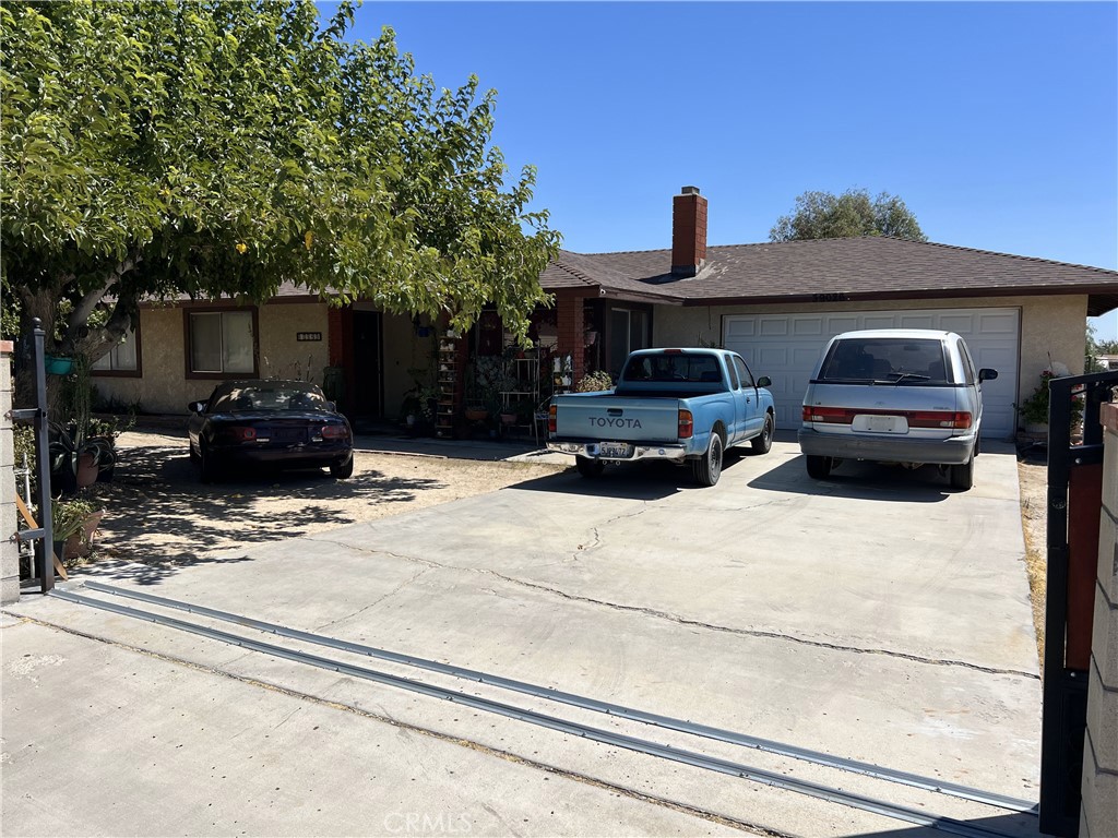 a view of a car parked in front of house