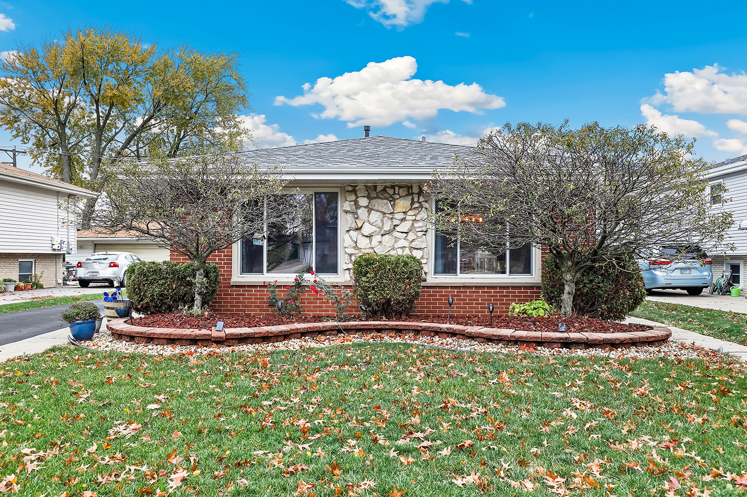 a front view of a house with a yard