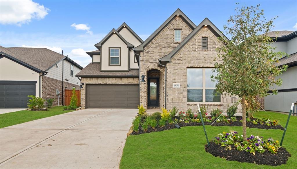 Gorgeous oversized kitchen with high-end stainless steel appliances and overall design selections.