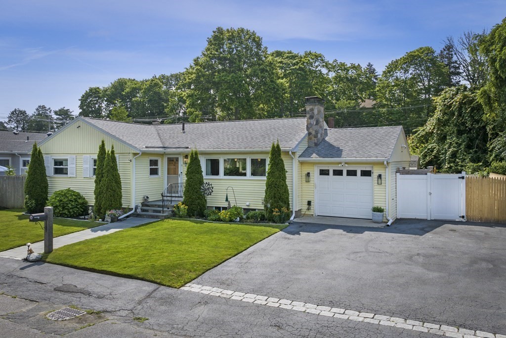 front view of a house with a yard