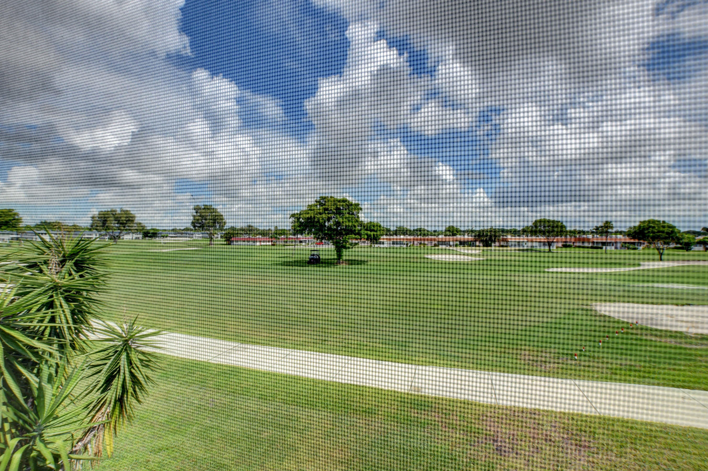 a view of a swimming pool and outdoor space