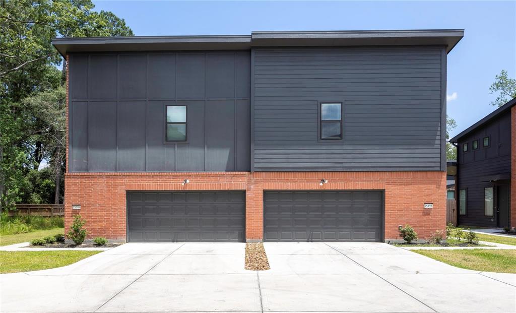 a front view of a house with yard