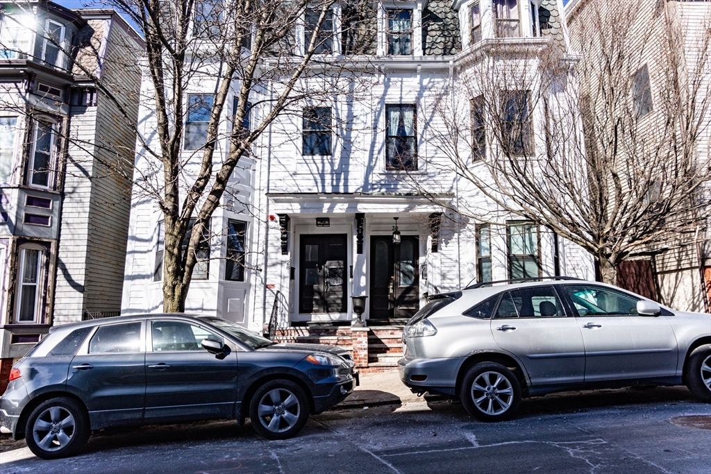 a car parked in front of a building