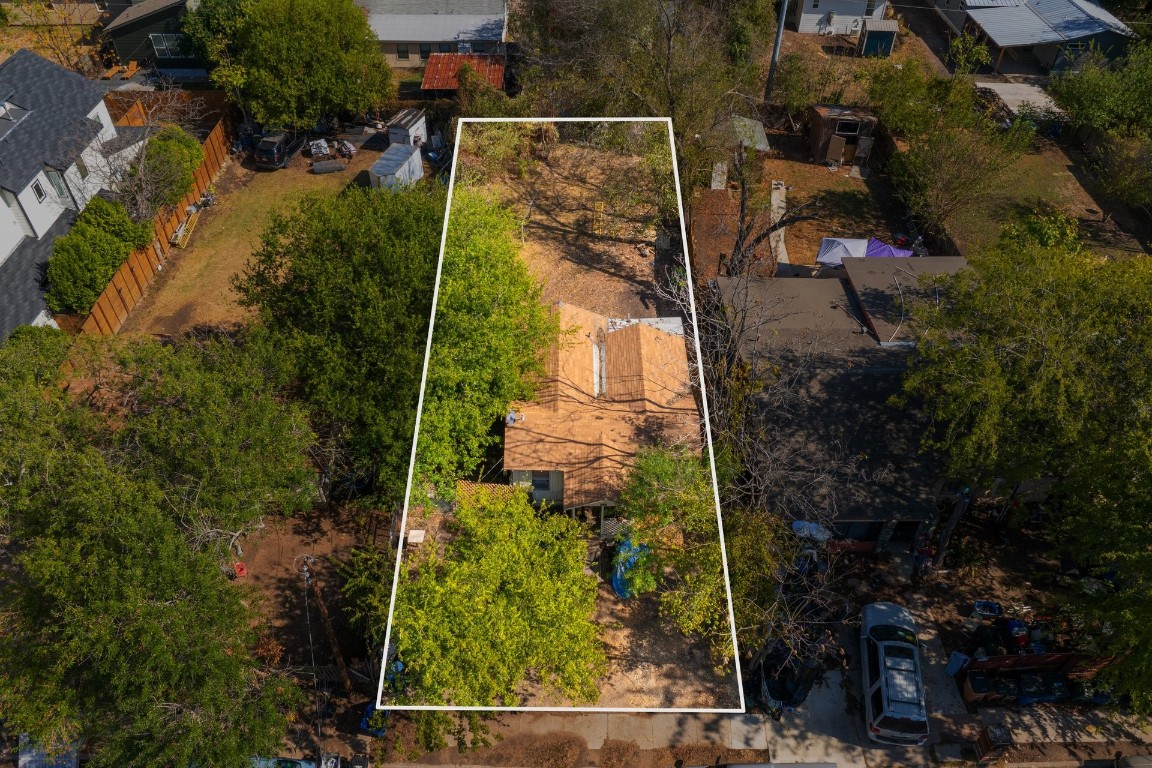 an aerial view of residential house with outdoor space