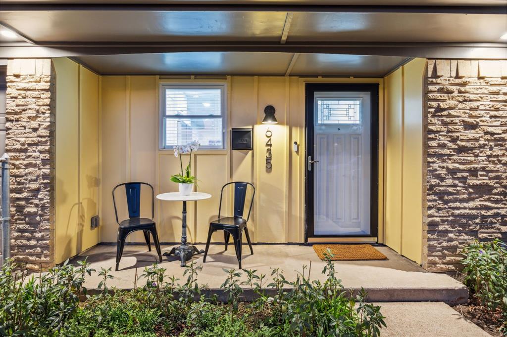 a view of a porch with chairs and entertaining space