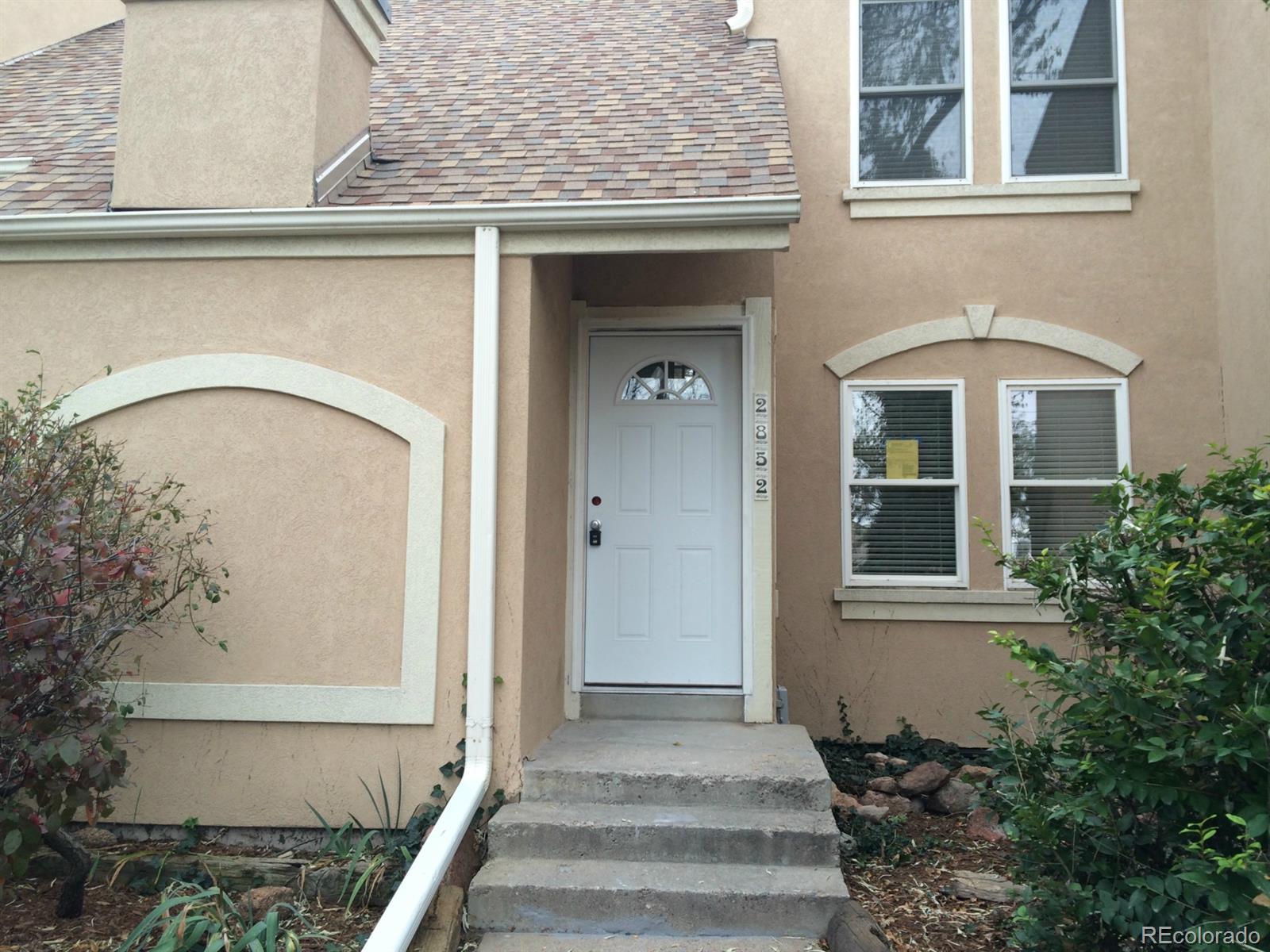 a front view of a house with a window