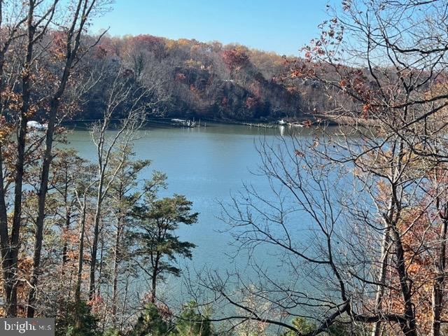 a view of lake with mountain