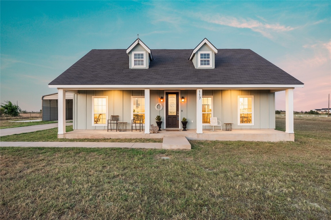 a front view of house with yard