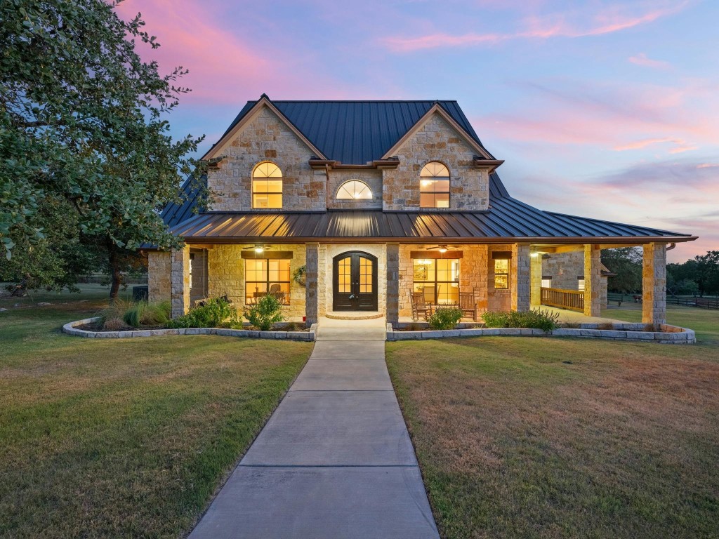 front view of a house with a yard