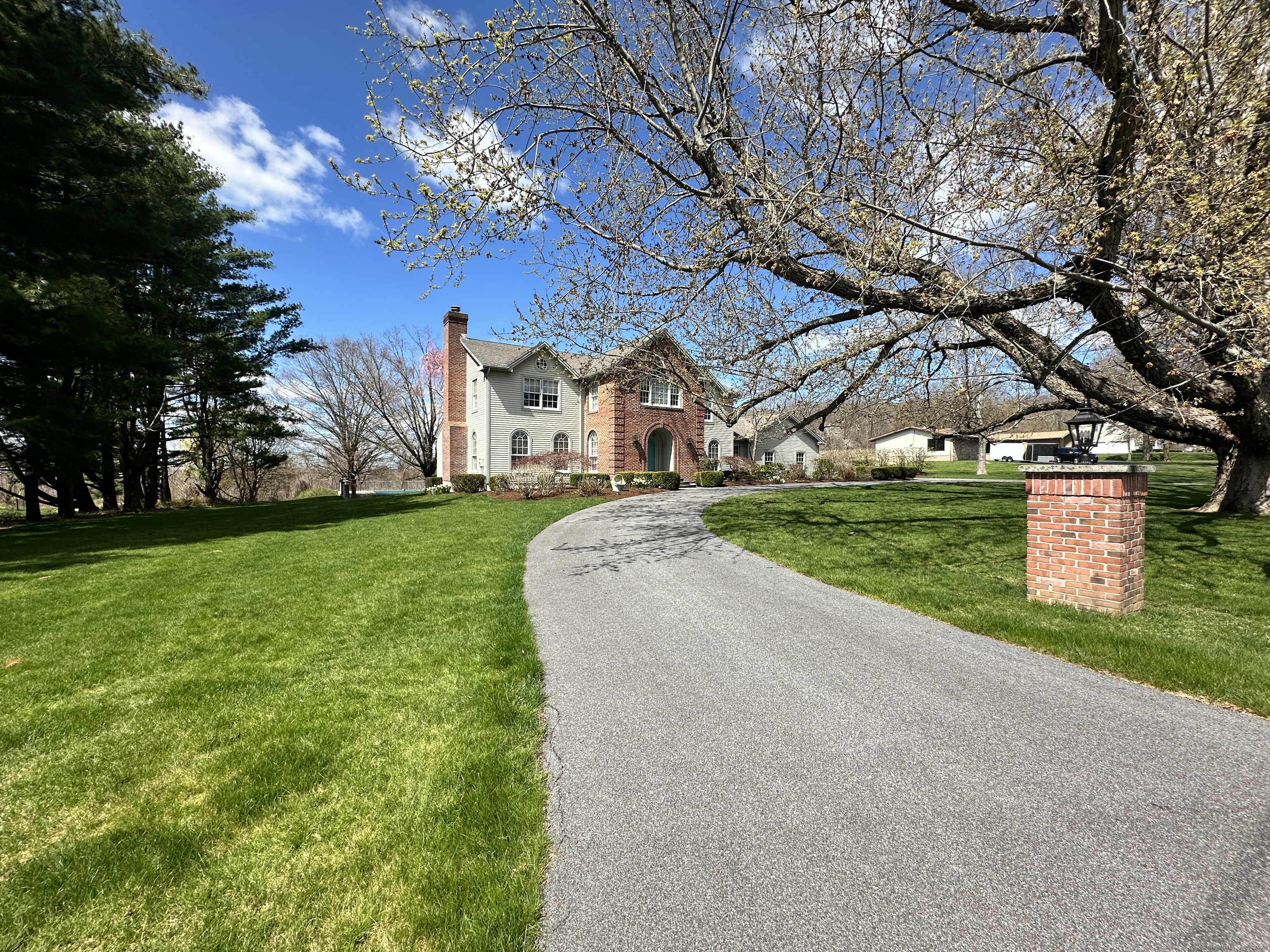 a view of a house with a big yard