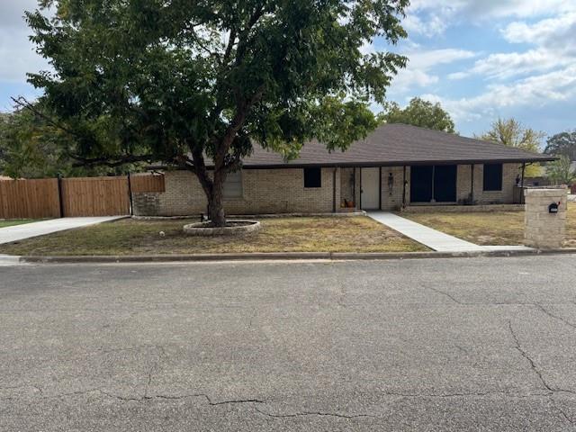 a house with trees in front of it