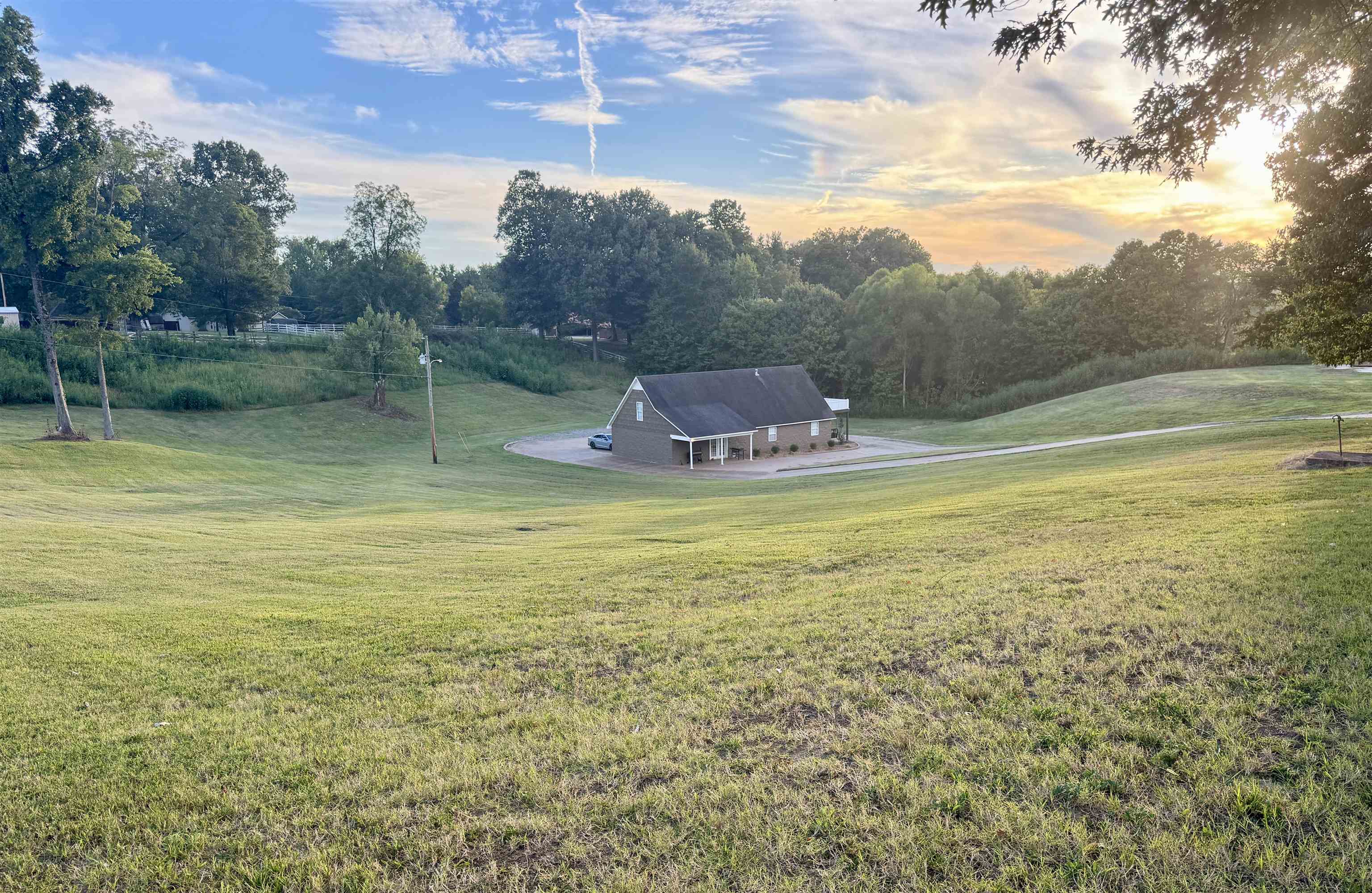 View of yard at dusk