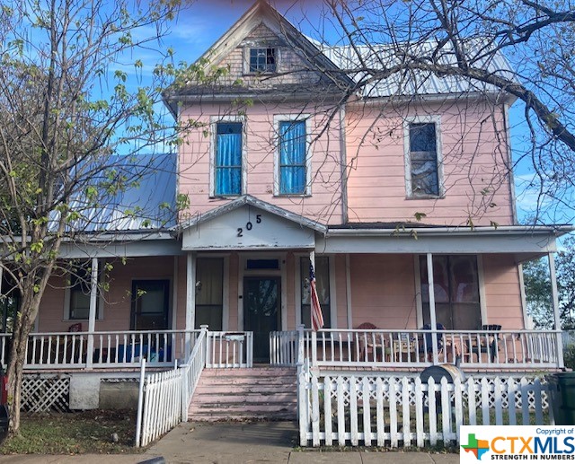 front view of a house with a porch