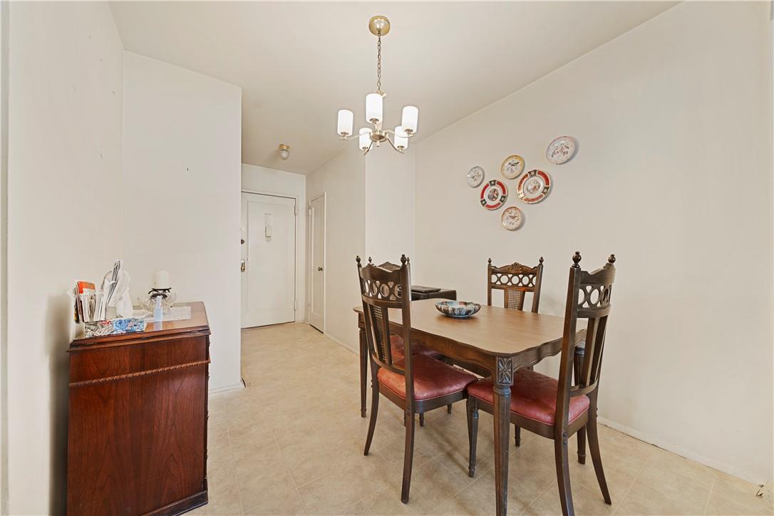 Dining space featuring an inviting chandelier