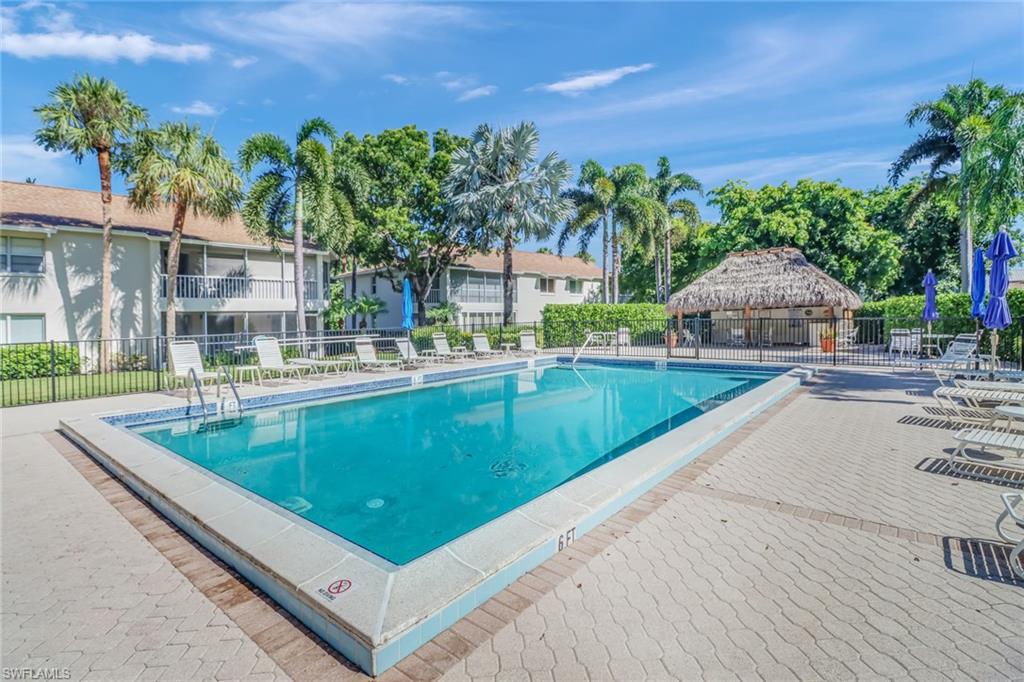 a view of a swimming pool with a patio