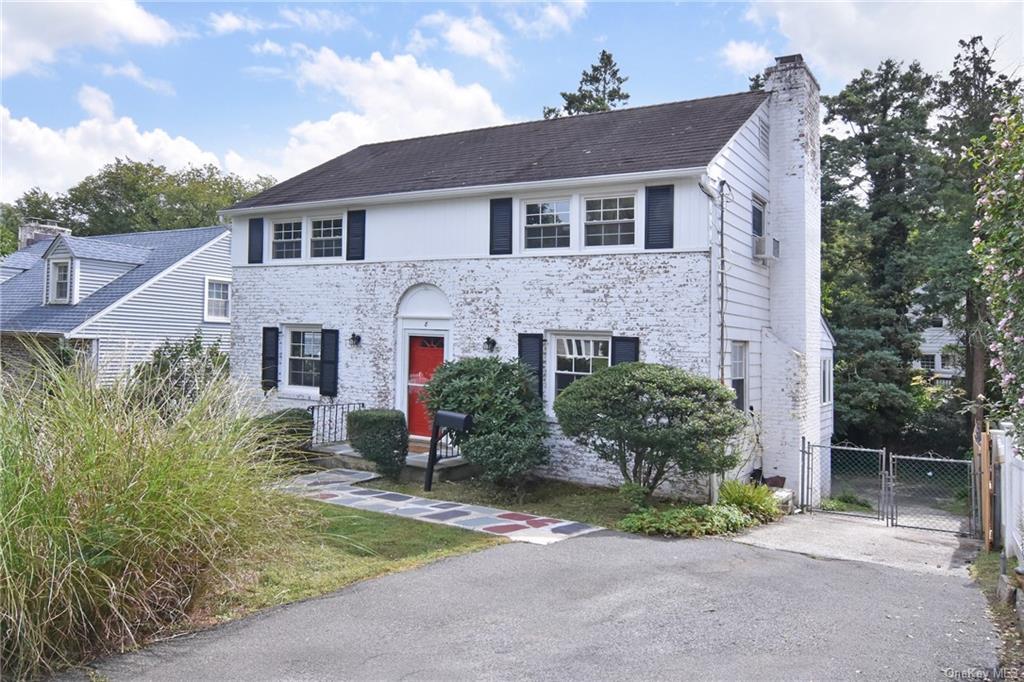 front view of house with a yard