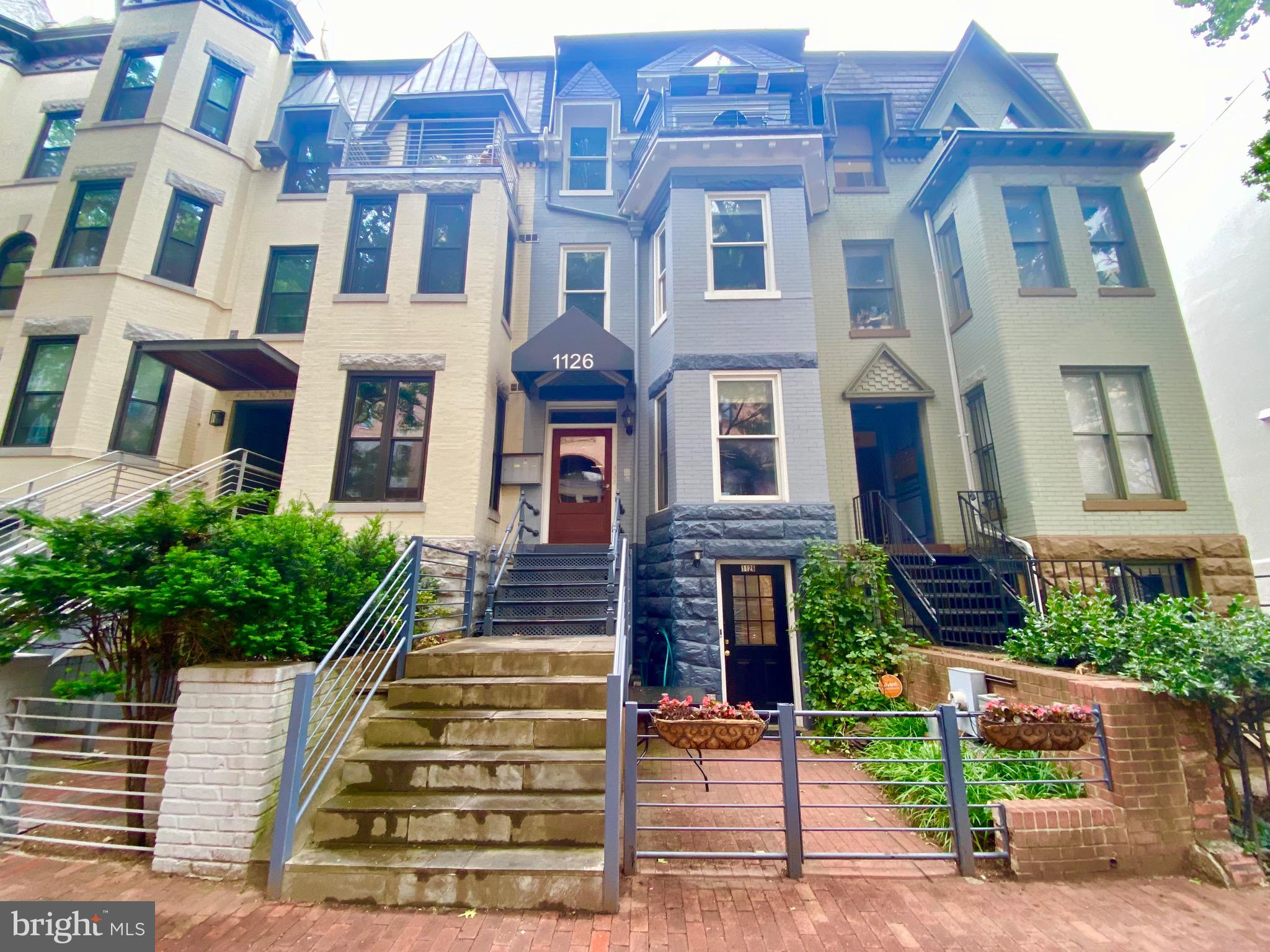 a front view of a multi story residential apartment building