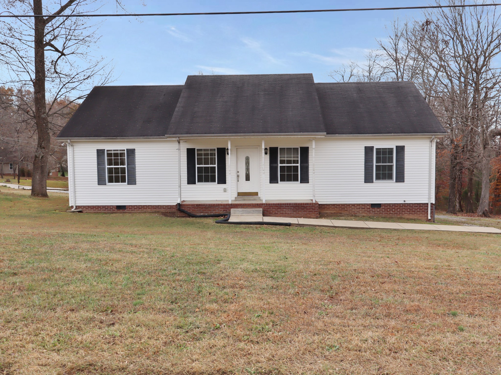 a front view of house with yard