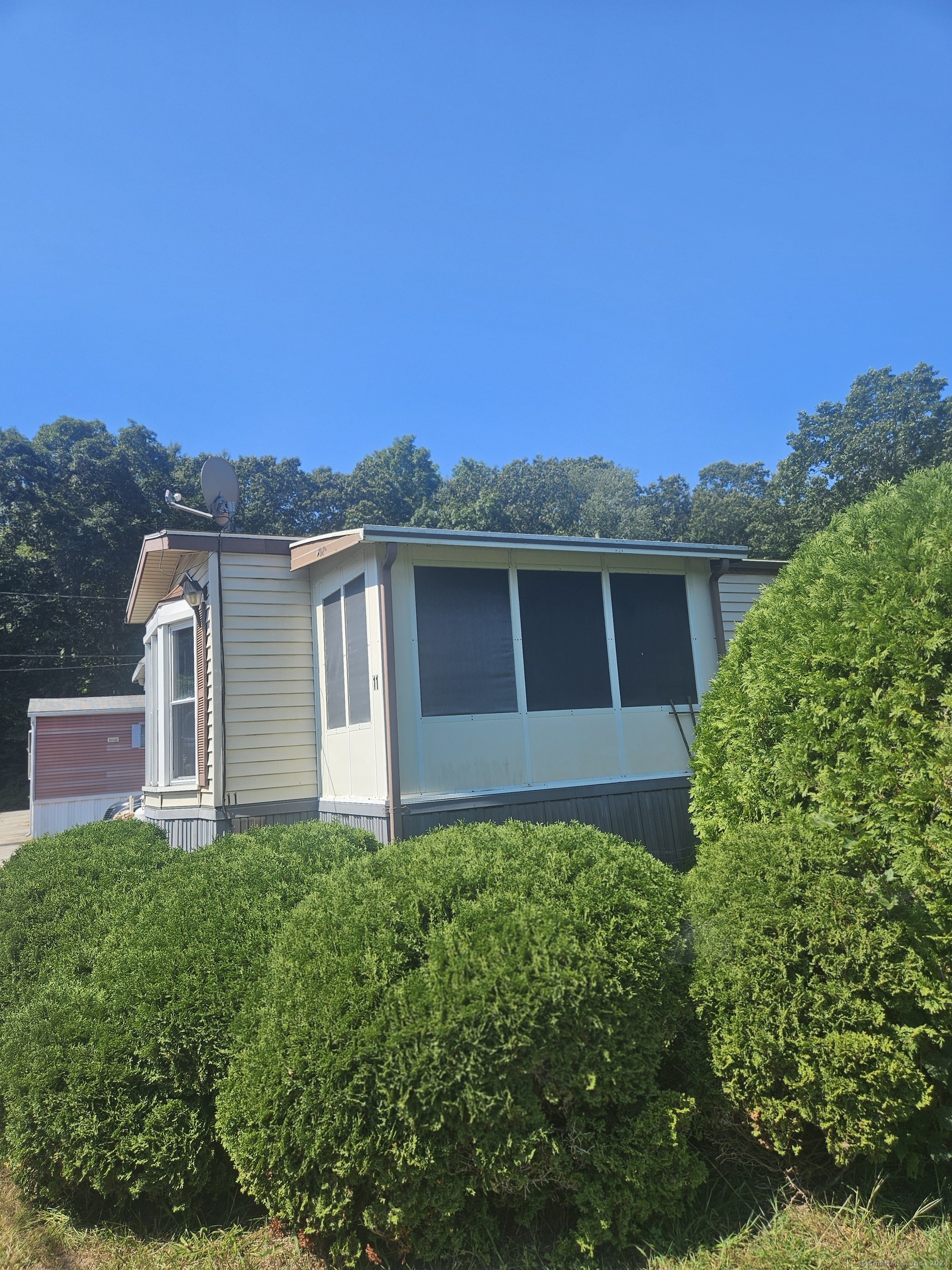 a view of a house with a garden