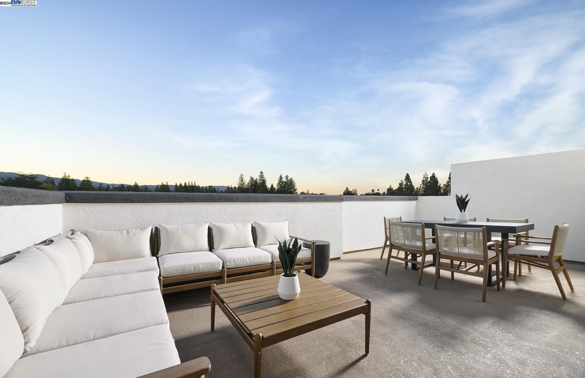 a view of a terrace with furniture