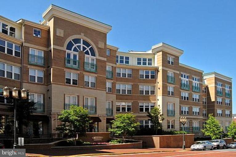 a front view of a building with street view