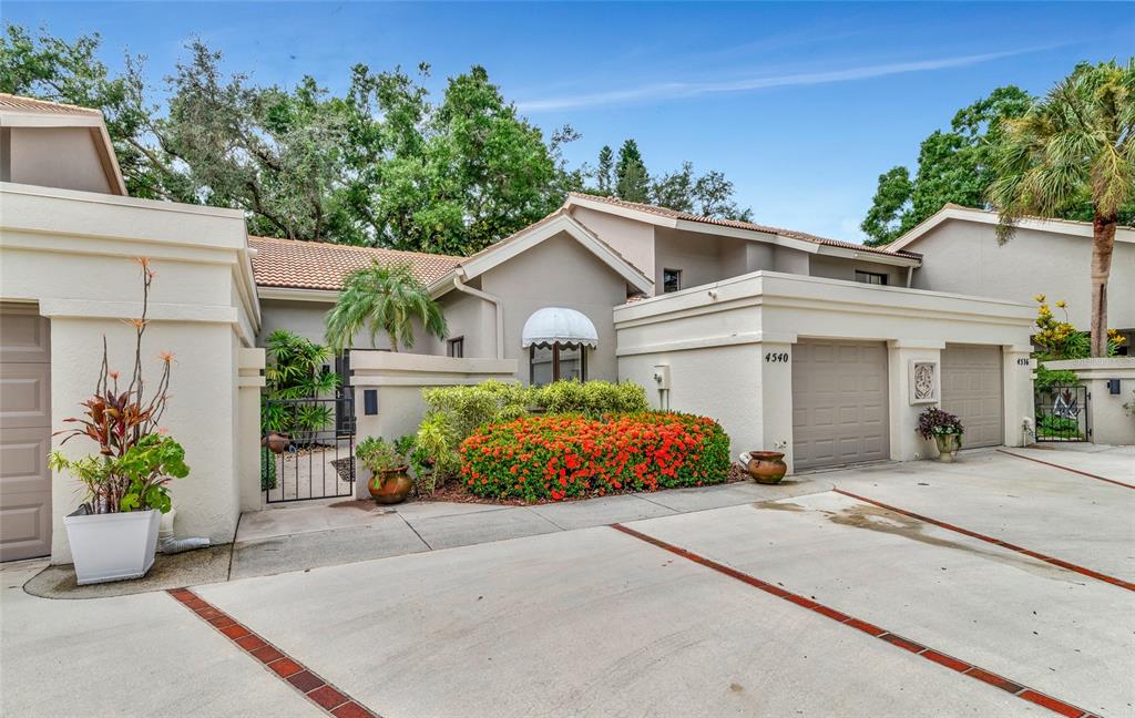 a front view of a house with a garage