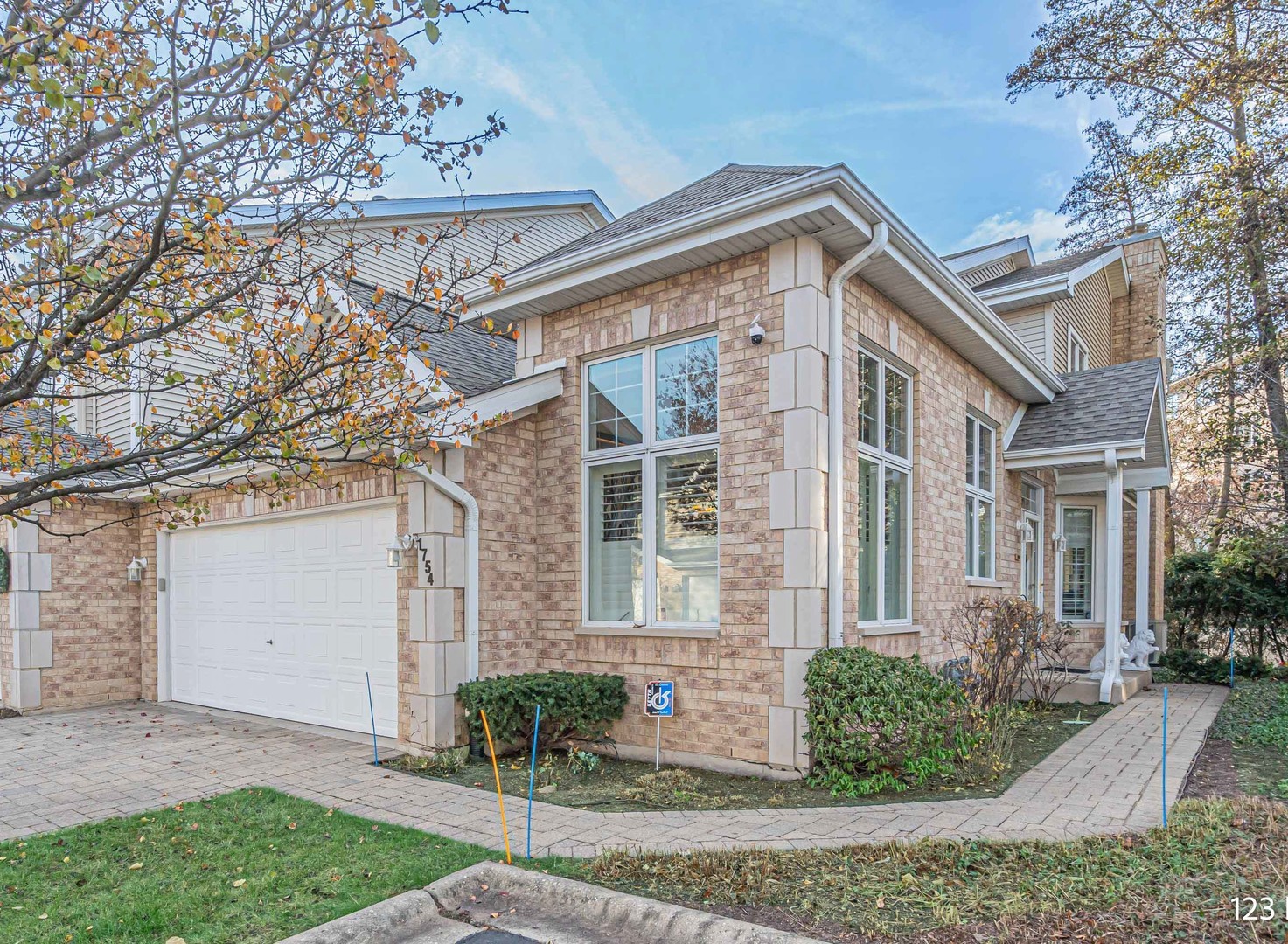 front view of a house with a yard