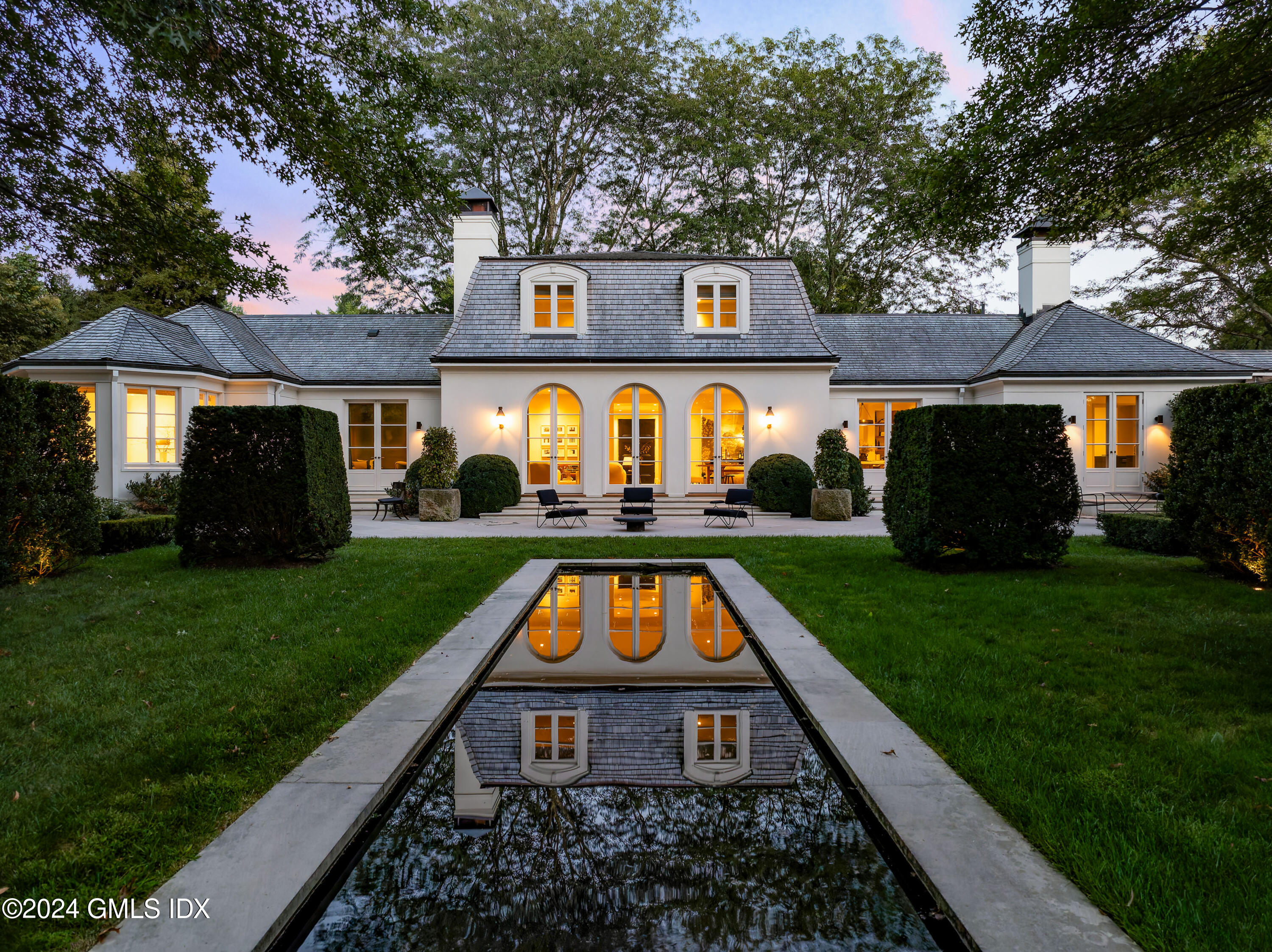 a view of a back yard with green space