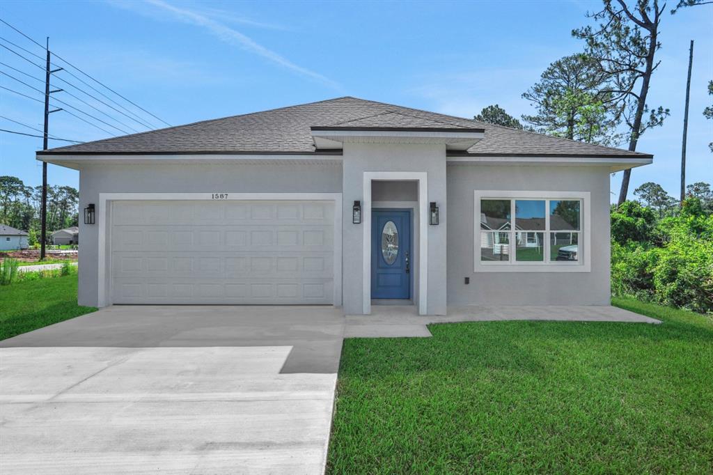 front view of house with a yard