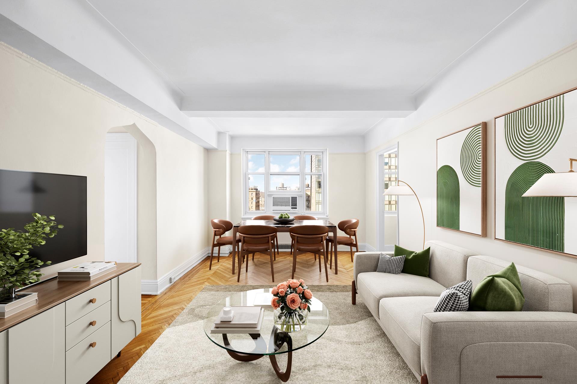 a living room with furniture and wooden floor