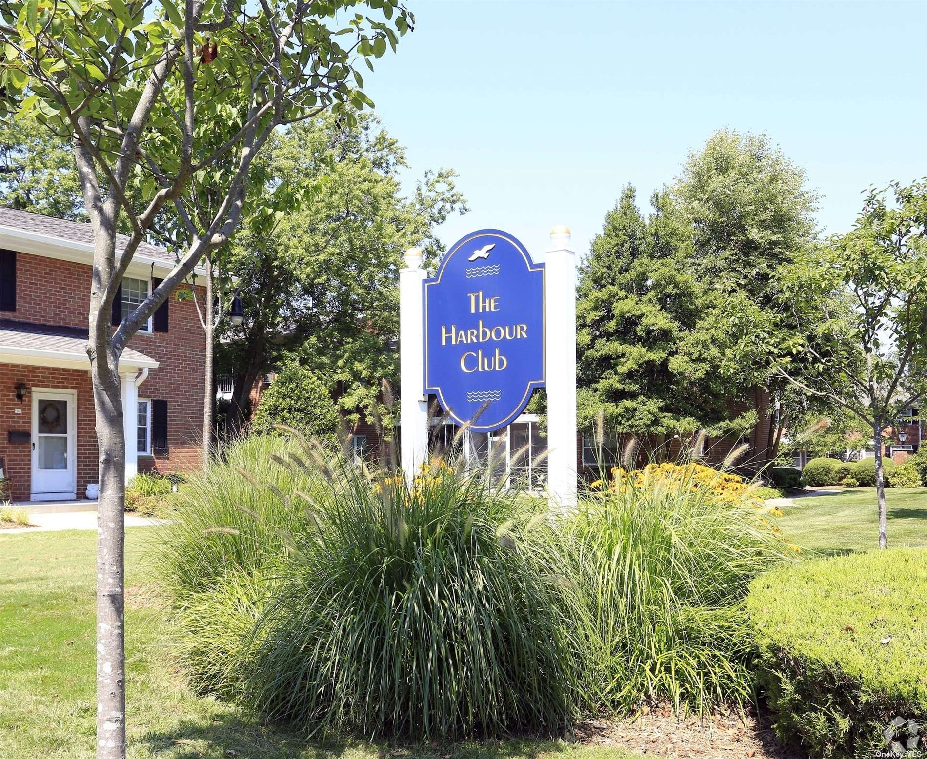 a sign board with yard