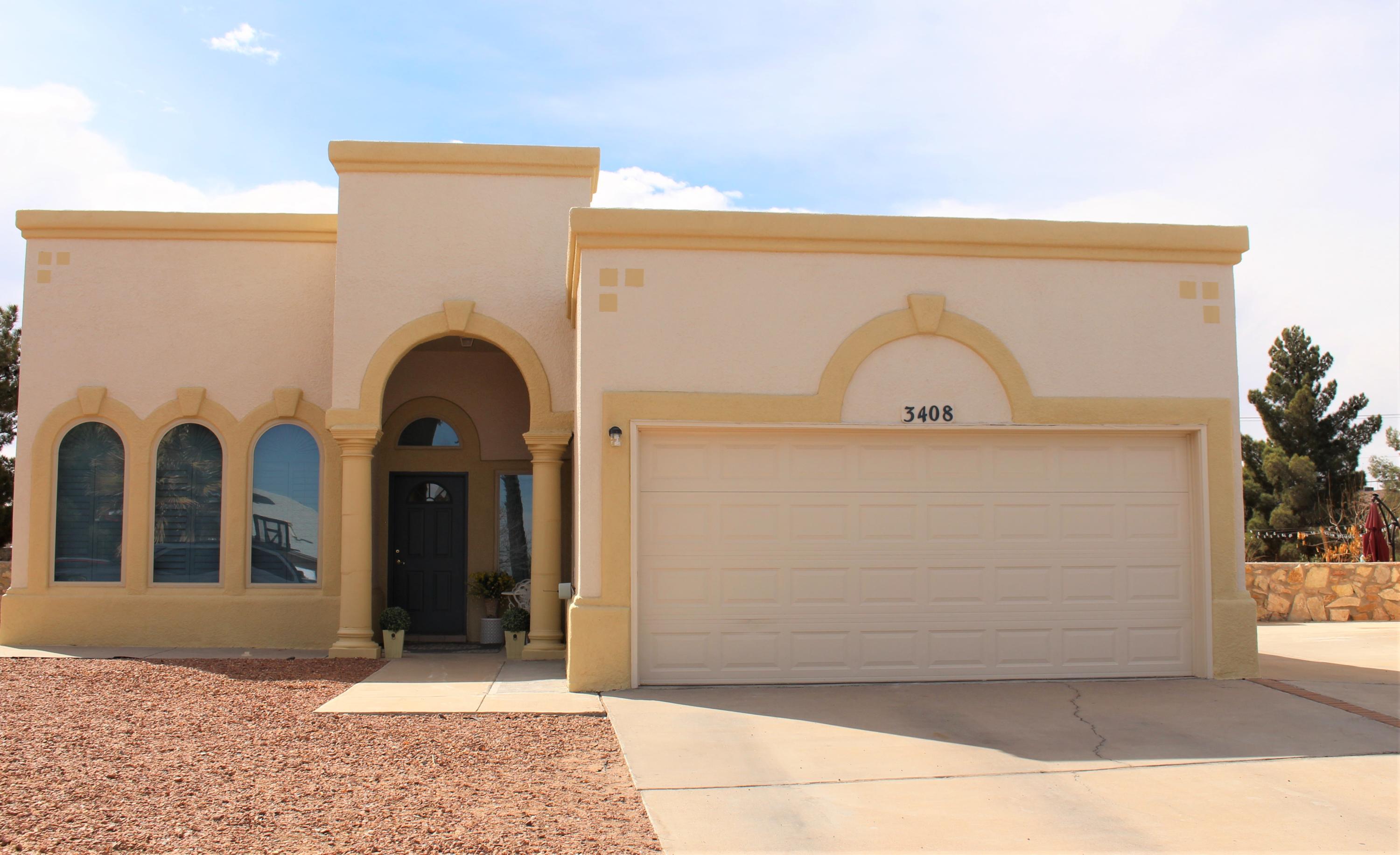 a view of entrance gate of the house