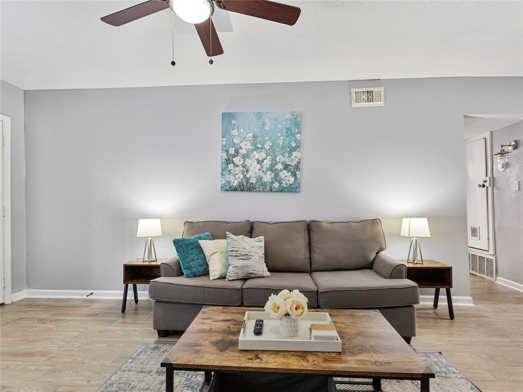 a living room with furniture and a couch