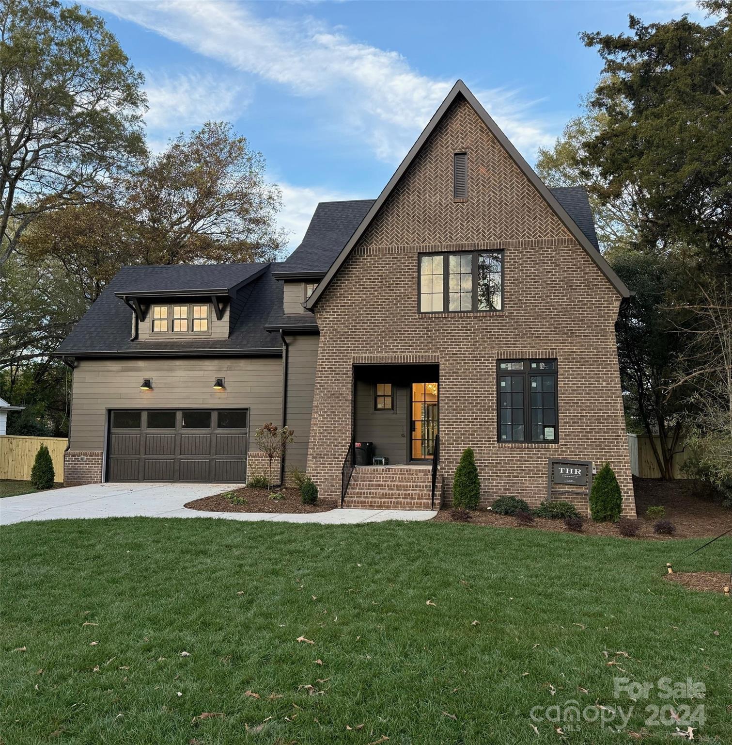 a front view of house with yard