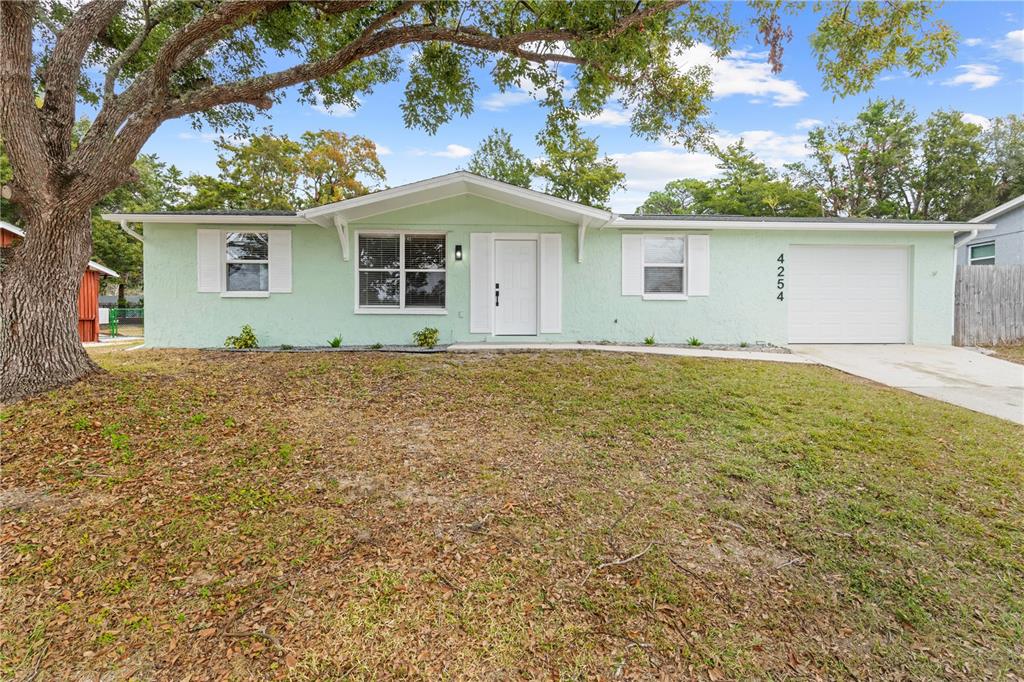 front view of a house with a yard