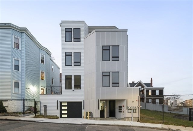 a front view of a house with balcony