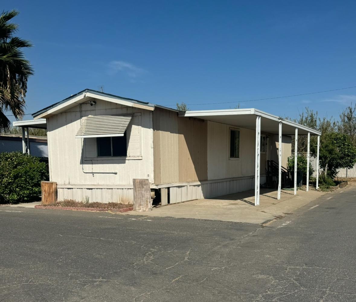 a front view of a house with a garage